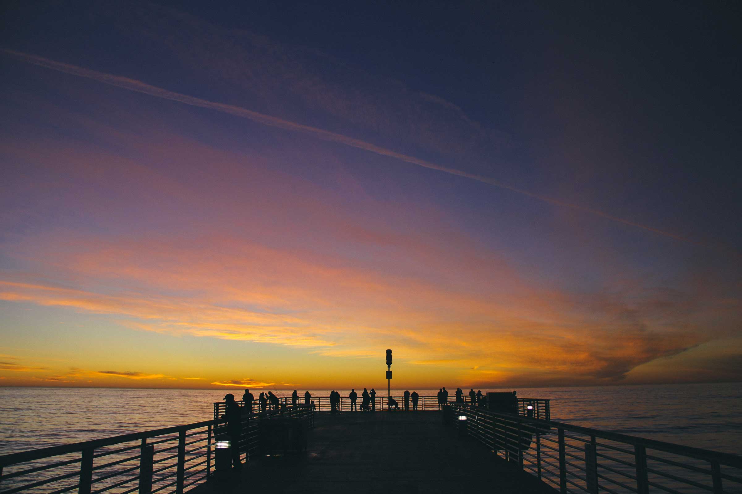 A pier at sunset